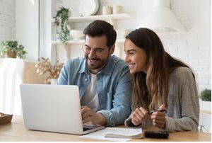 couple looking at laptop